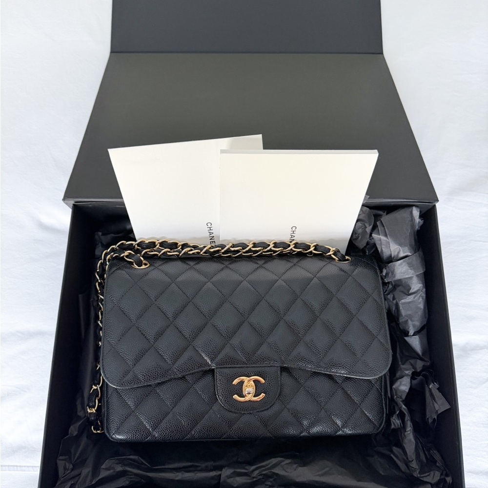 CHANEL Jumbo Black Quilted Caviar Leather, Double Flap with Gold Hardware